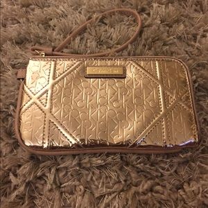 Calvin Klein Metallic Rose Gold wristlet